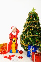 Child and christmas tree