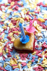 Fototapeta na wymiar sugar letters with birthday candle