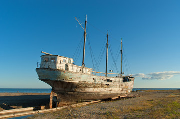 Fototapeta premium Ruins of an old fishing boat.