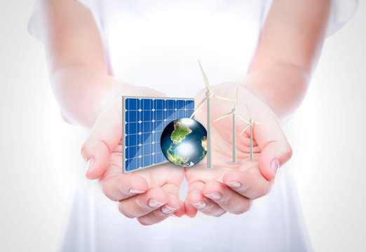 Woman hands hold Alternative Energy (solar cell, earth, wind tur