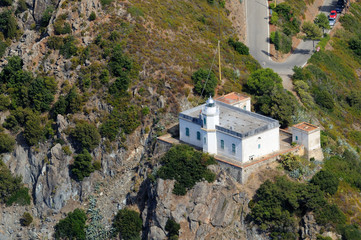 Fototapeta na wymiar Isola d'Elba - latarnia morska w Punta Polveraia