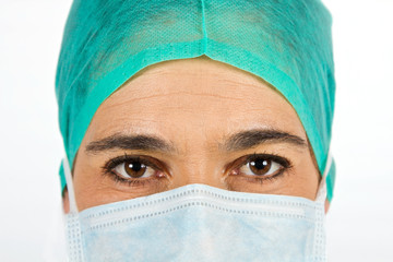 Female cardiac surgeone closeup with mask