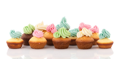 Obraz na płótnie Canvas Cupcakes with colorful butter cream