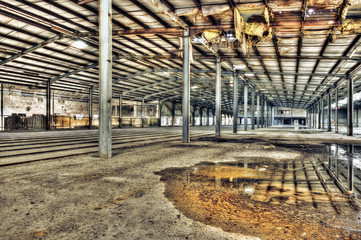 Derelict interior of dilapidated warehouse