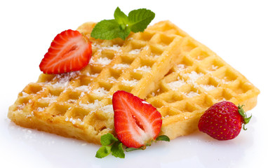 belgium waffles with strawberries and mint  isolated on white