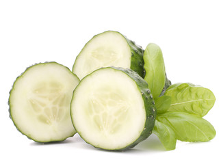 Sliced cucumber vegetable and basil leaves still life