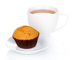 Fresh muffin with tea isolated on white