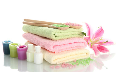 towels with lily, aroma oil,  candles and sea salt isolated