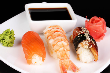 delicious sushi served on plate close-up