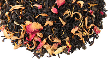 aromatic black dry tea with fruits and petals, isolated on