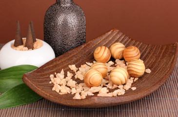 aromatherapy setting on brown background .