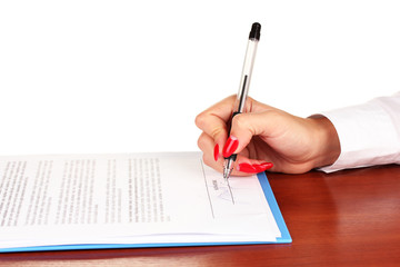 signing of treaty on wooden table isolated on white