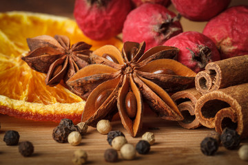 Close-up of anise star with cinnamon and dried orange