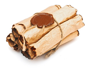 pile old paper scrolls with a wax seal on a white background