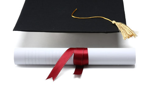 Graduation Cap And Diploma Isolated On White Background