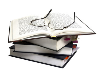 Glasses on open book
