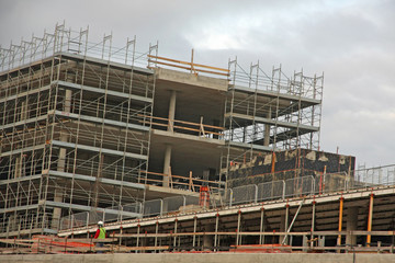 scaffolding n a construction site of a large concrete building