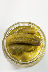 Pickled gherkins in glass jar