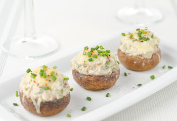 Stuffed mushrooms, baked with cheese and herbs, selective focus