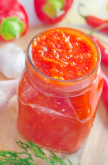 Fresh chilli sauce in the glass bank