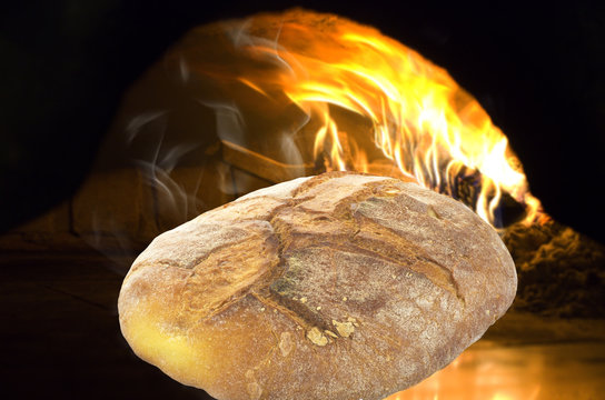 Bread Steaming Out Of A Pizza Oven