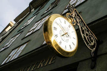 Fotobehang Europa Street clock (Einsiedeln, Switzerland)  © tempisch