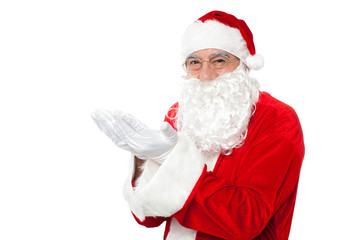 Happy Santa Claus smiling with open palms