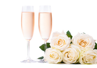 cold champagne and a bouquet of roses