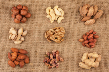 Assorted nuts lying on burlap