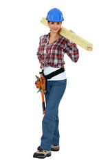 craftswoman holding a board