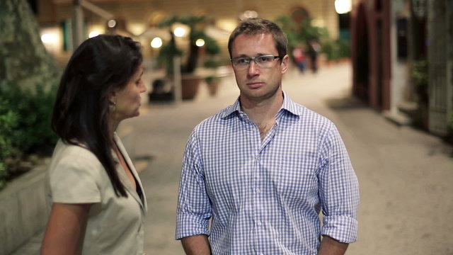 Relationship difficulties, couple fighting in the city