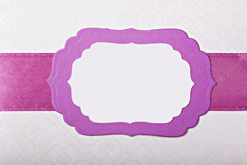 Violet paper frame with ribbon