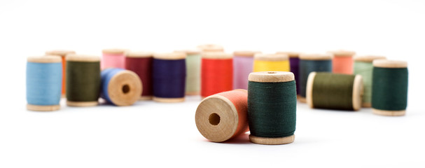 Many bright colored spools of thread