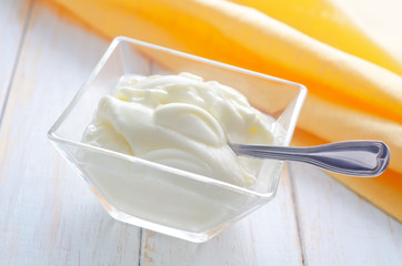 sour cream in glass bowl