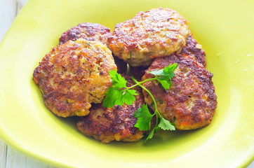 cutlets on the green plate