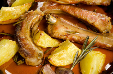 Pork ribs with baked potatoes