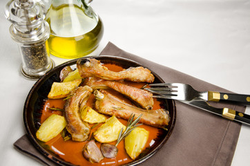 Pork ribs with baked potatoes