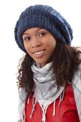 Closeup portrait of ethnic woman in cap