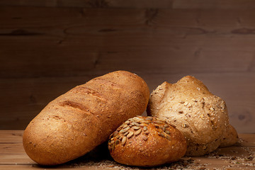 white bread over wooden background
