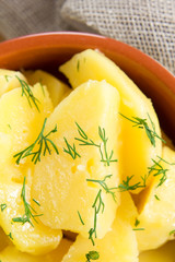 Boiled potatoes with dill and butter
