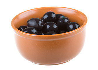 Olives black watered with olive oil in a bowl isolated on a whit