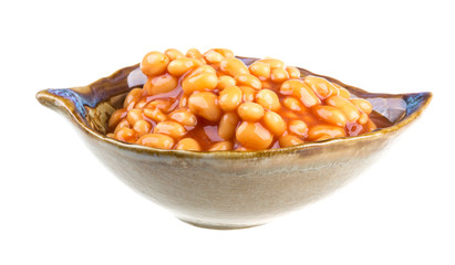 Marinated haricot beans in tomato sauce with shallots on a plate