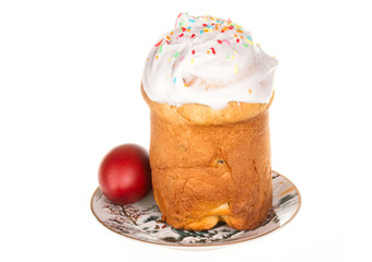 Easter cake with glace icing and easter eggs on white background
