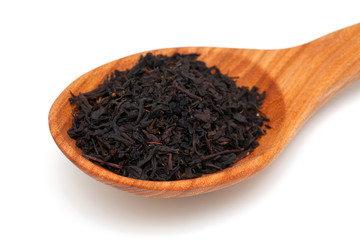 tea on wooden spoon
