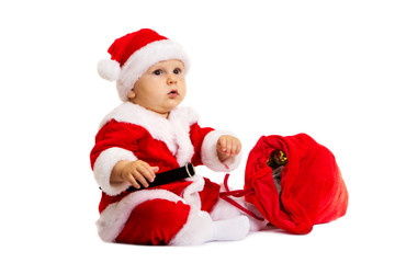 Small Santa with red bag for gifts near him