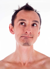 Obraz premium Humorous emotional portrait of grimacing young man