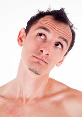 Obraz premium Humorous emotional portrait of grimacing young man