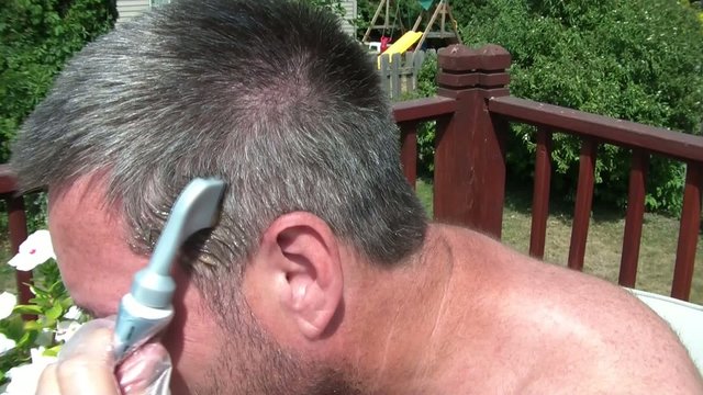 Man Dying Grey Hair in Sun