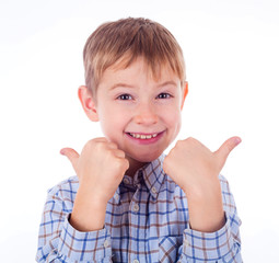 Happy boy pointing with his finger