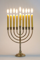 Hanukkah menorah with burning candles
